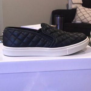 Black Steve Madden slip on sneakers. New